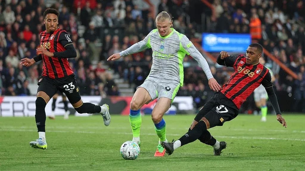 Erling Haaland in action against Bournemouth players Erling Haaland in action against Bournemouth players