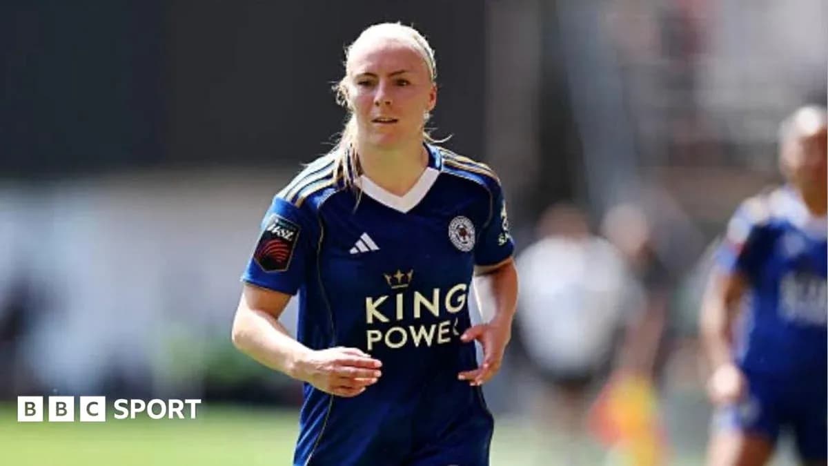 Female player running in blue Leicester City kit Female player running in blue Leicester City kit