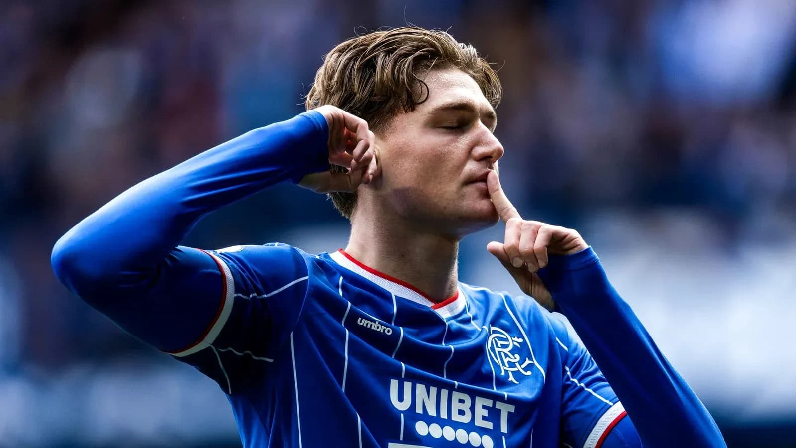 Player celebrating with finger on lips gesture Player celebrating with finger on lips gesture