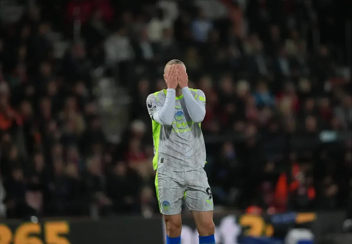 Goalkeeper with hands on face after conceding goal Goalkeeper with hands on face after conceding goal