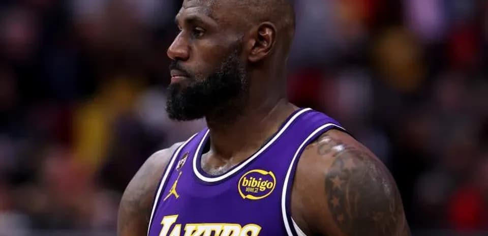 LeBron James in Lakers jersey during game LeBron James in Lakers jersey during game