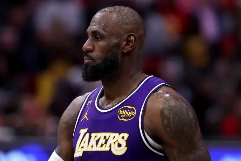 LeBron James in Lakers jersey during game LeBron James in Lakers jersey during game