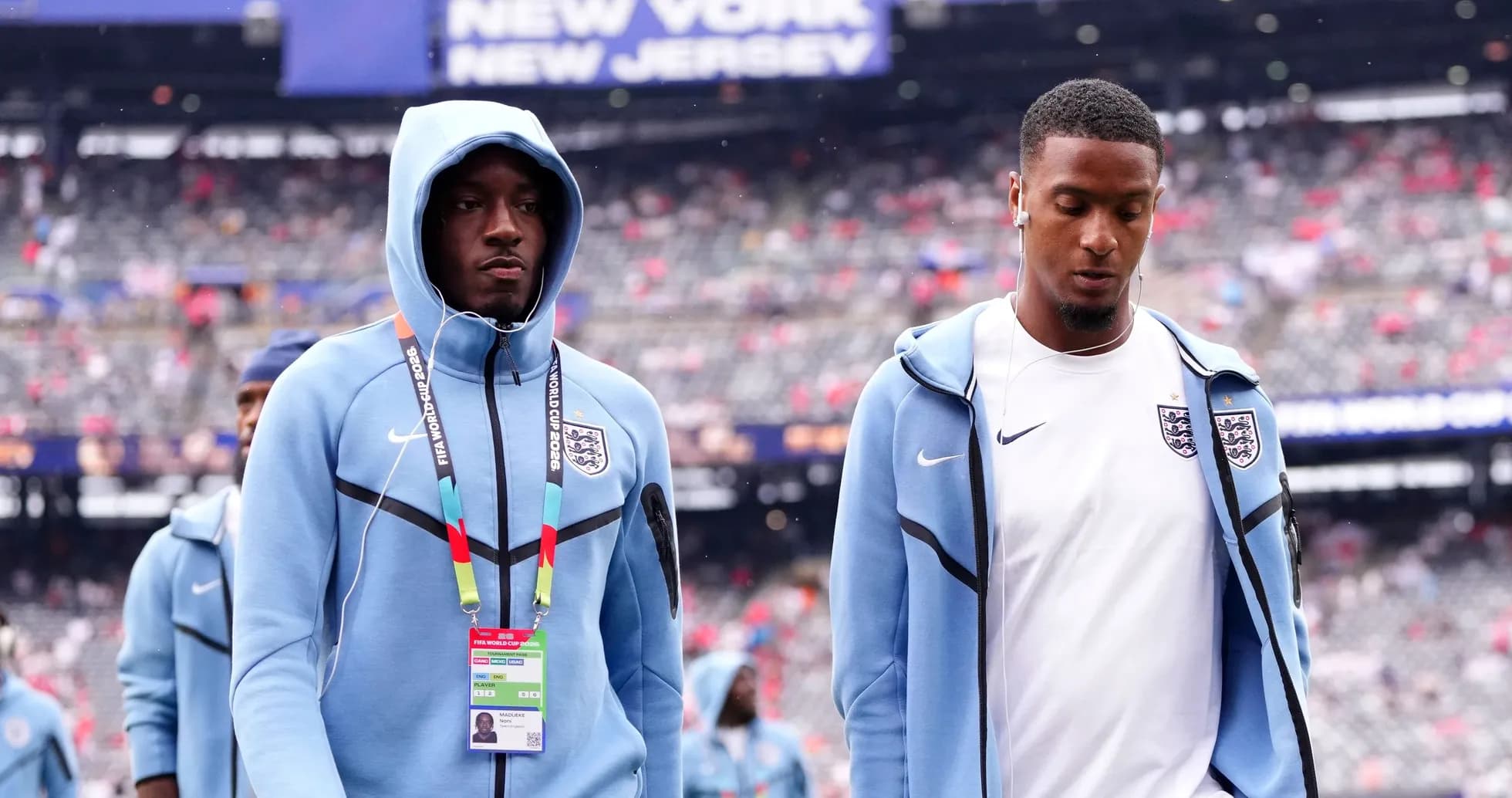 Two England players walking onto the pitch Two England players walking onto the pitch