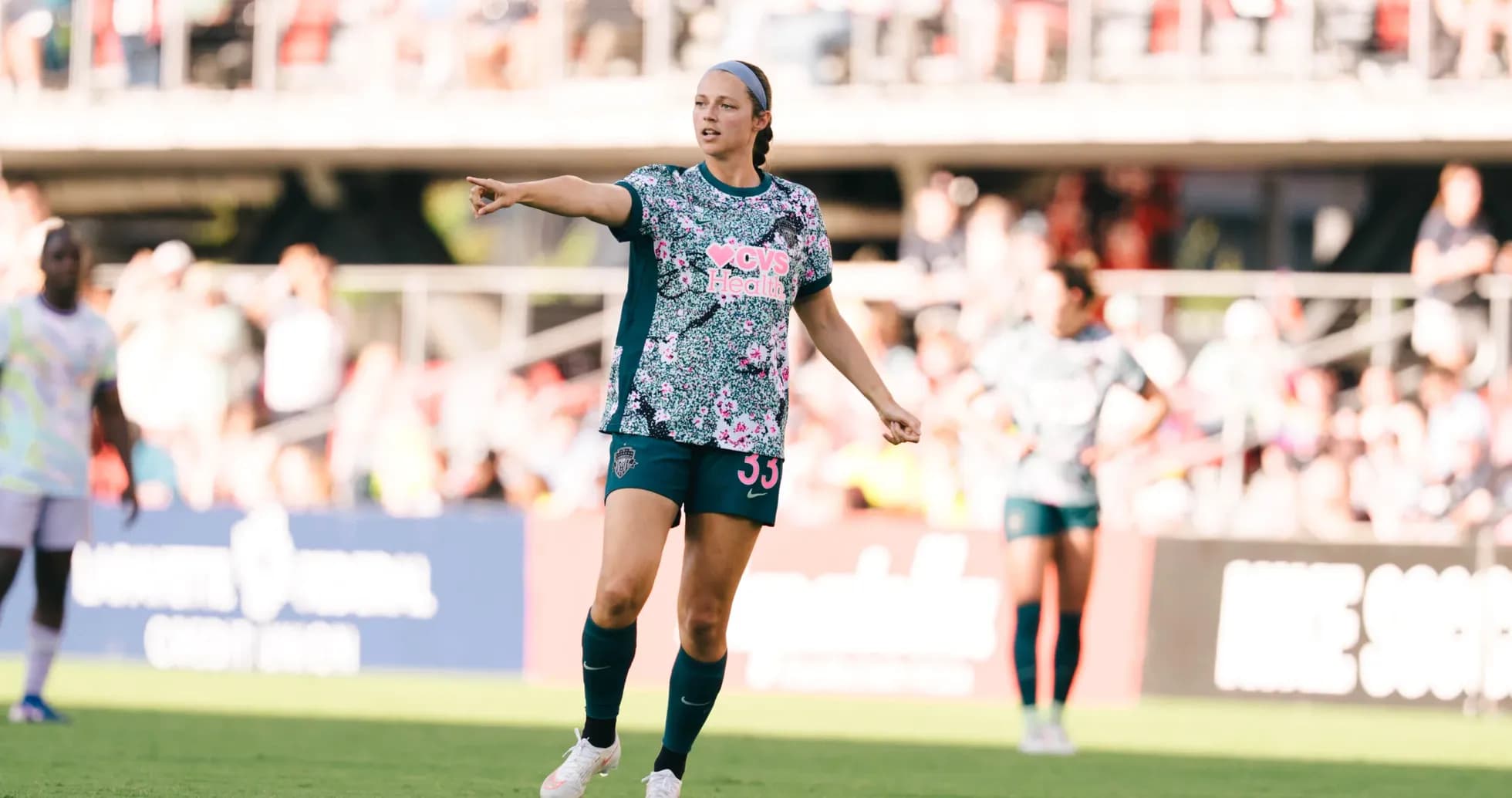 Player directing teammates during NWSL match Player directing teammates during NWSL match