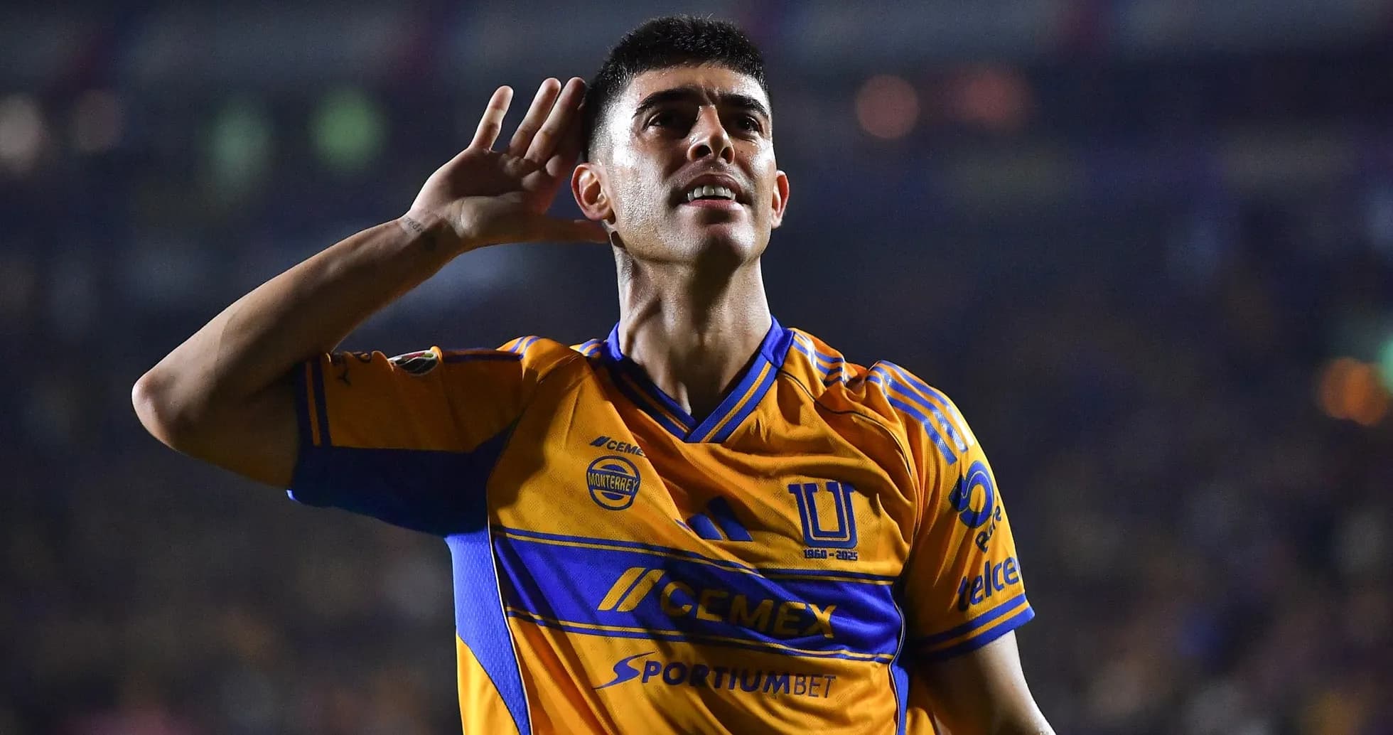 Tigres UANL player celebrating a goal Tigres UANL player celebrating a goal