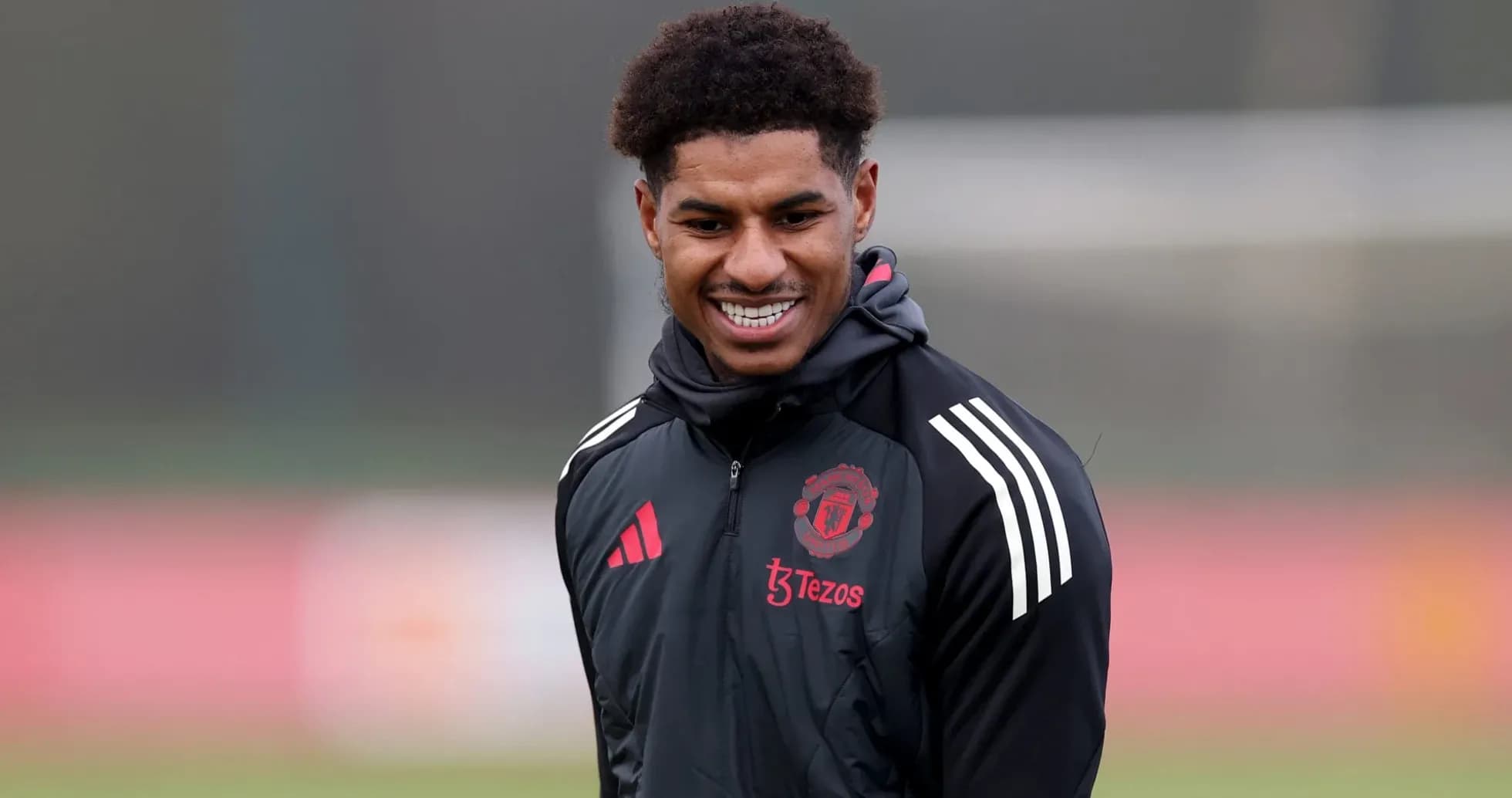Player smiling during Manchester United training session Player smiling during Manchester United training session