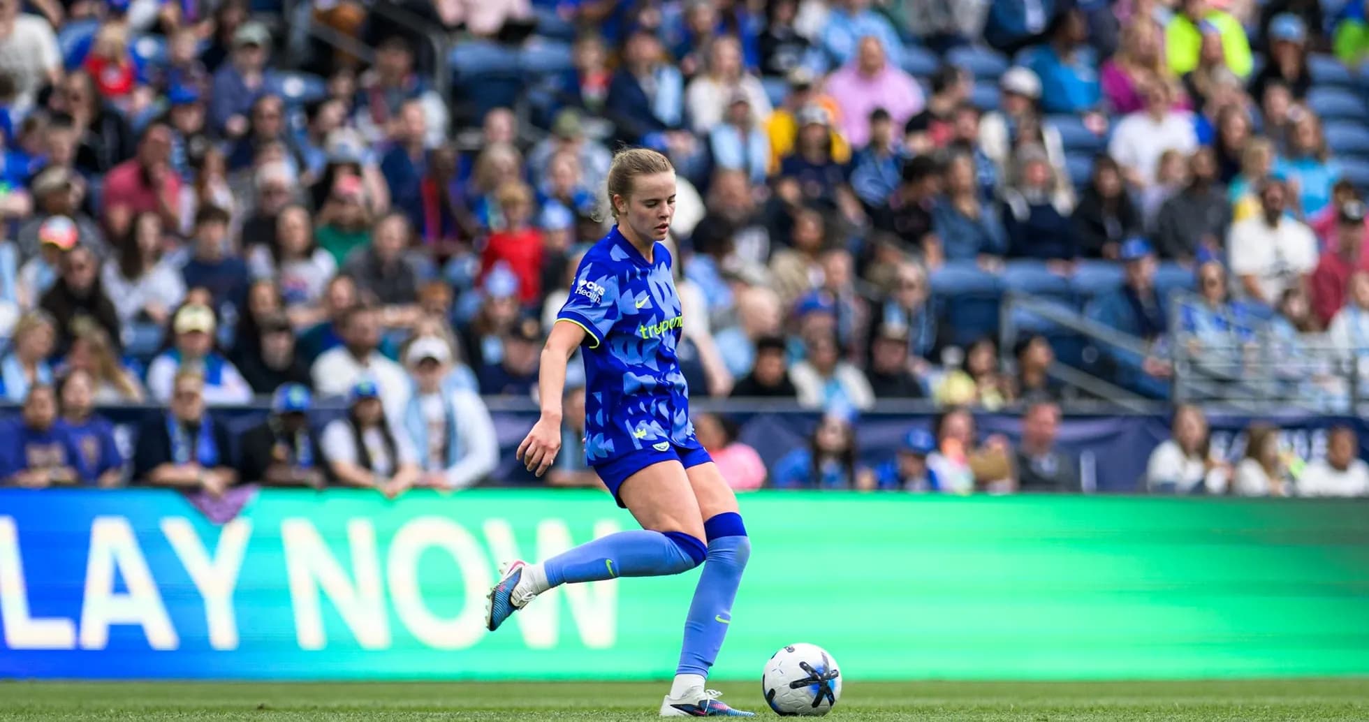 Player kicking the ball during match Player kicking the ball during match