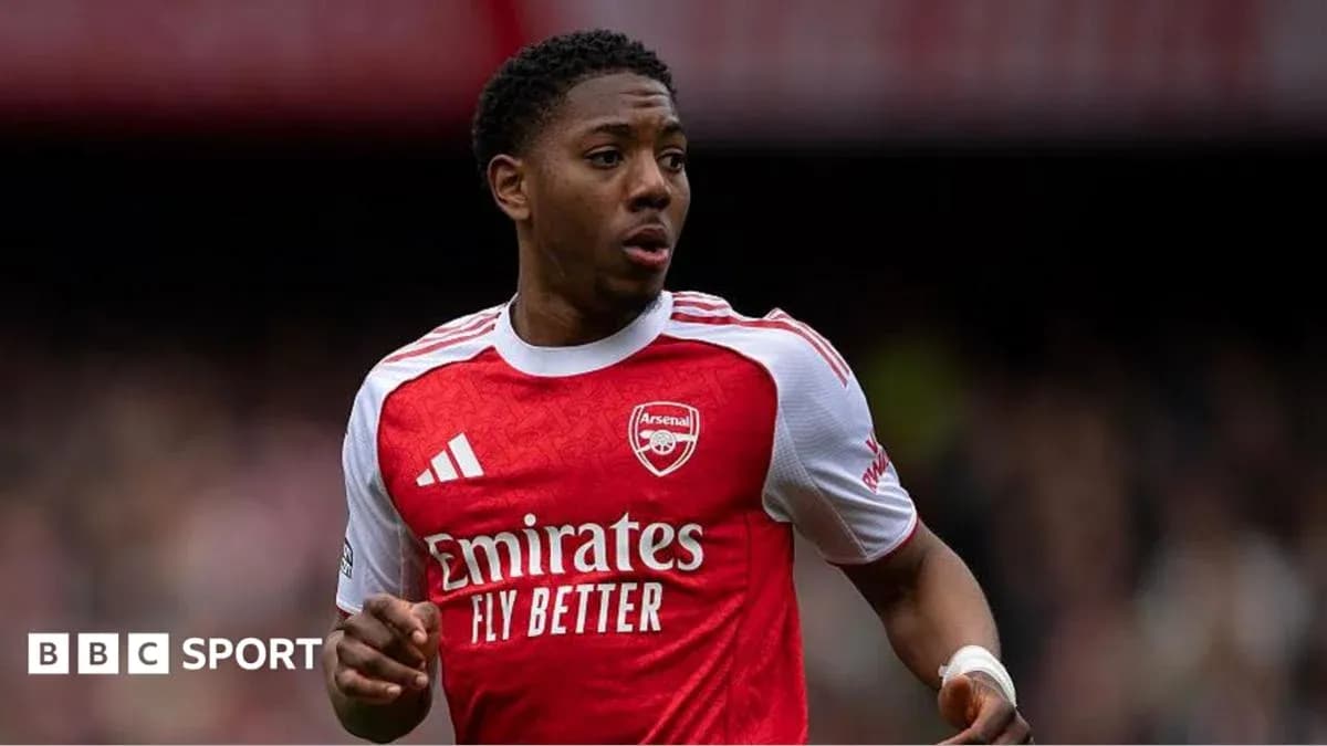Player wearing Arsenal jersey during a match Player wearing Arsenal jersey during a match