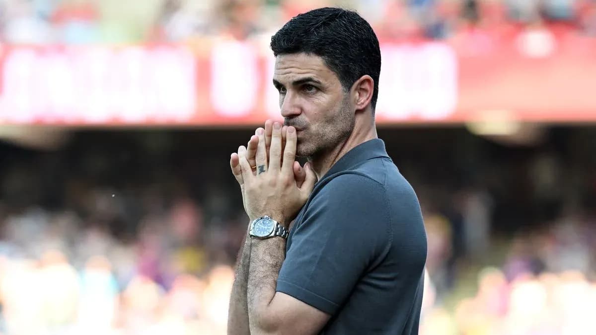 Manager contemplating during a football match Manager contemplating during a football match