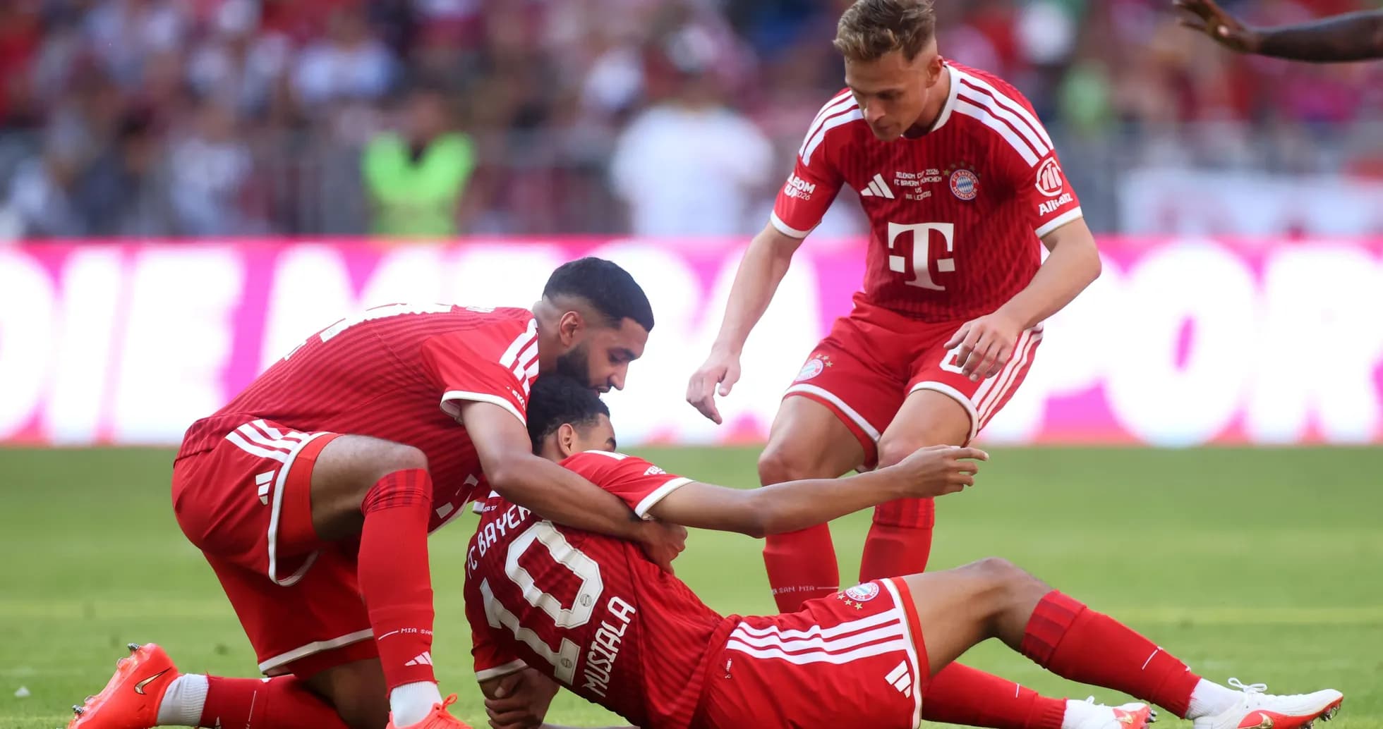 Bayern Munich players celebrating on the field Bayern Munich players celebrating on the field