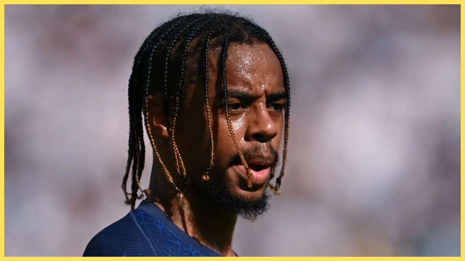 Player with braided hair on the field Player with braided hair on the field