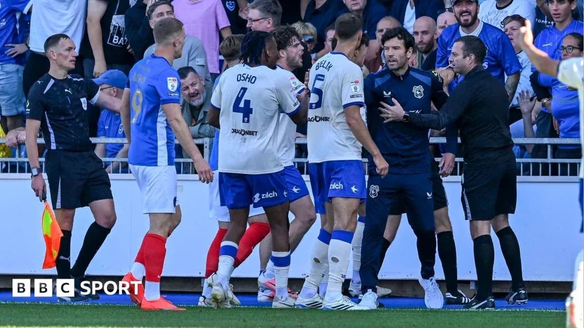 Players and officials in confrontation during match Players and officials in confrontation during match