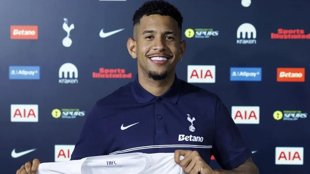 Player holding Tottenham Hotspur jersey at presentation Player holding Tottenham Hotspur jersey at presentation