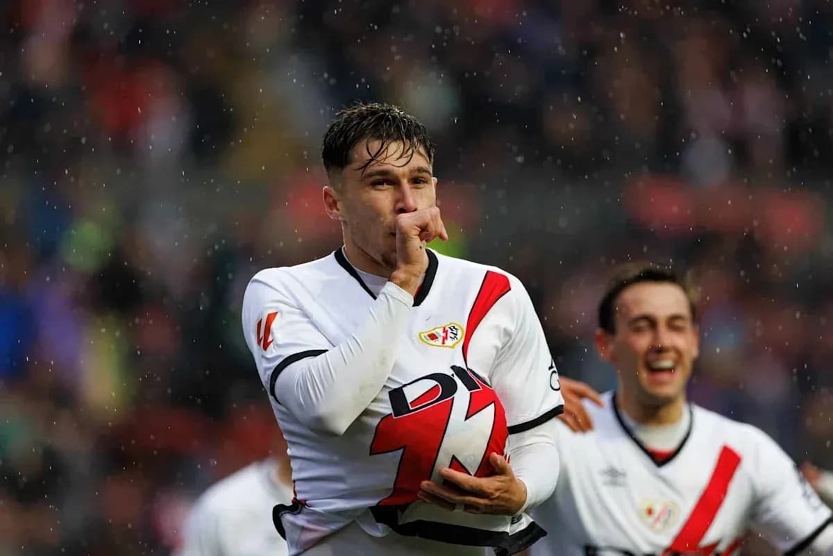 Player celebrating with ball after scoring goal Player celebrating with ball after scoring goal