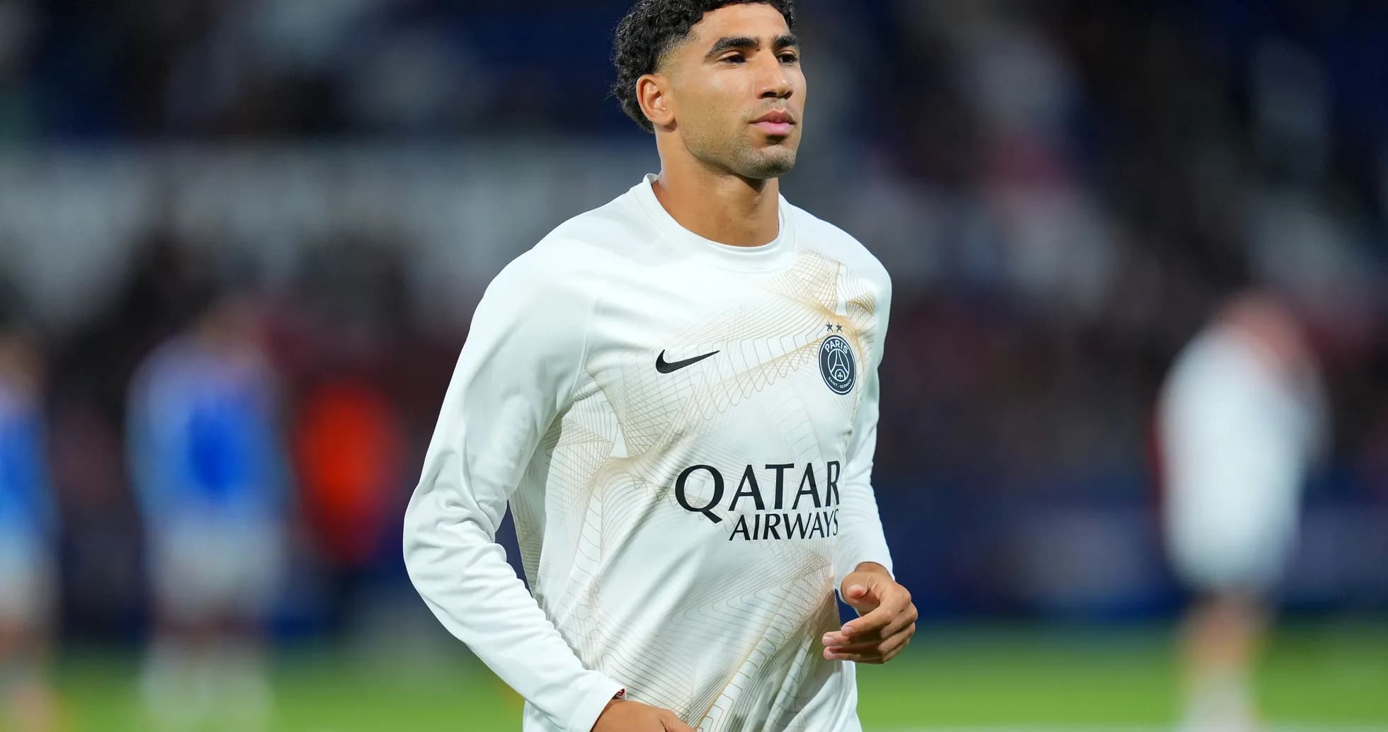 Player warming up in PSG training kit Player warming up in PSG training kit