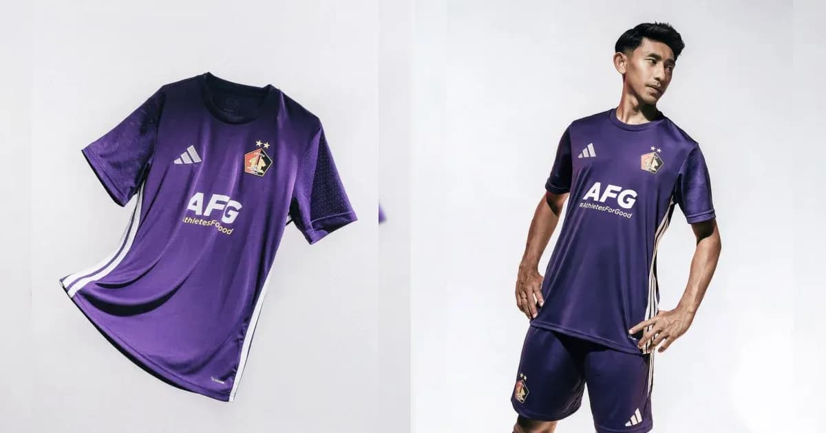Purple soccer jersey displayed with player wearing it Purple soccer jersey displayed with player wearing it