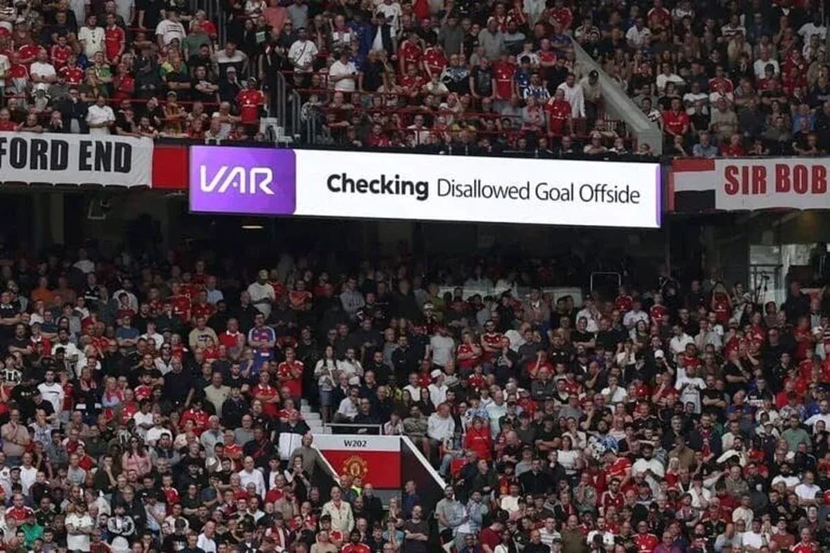 Crowd watching VAR announcement for disallowed goal Crowd watching VAR announcement for disallowed goal