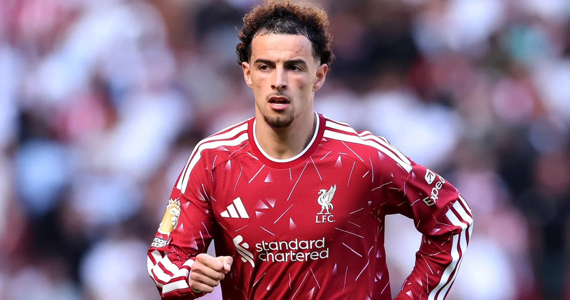 Player wearing Liverpool jersey during match action Player wearing Liverpool jersey during match action