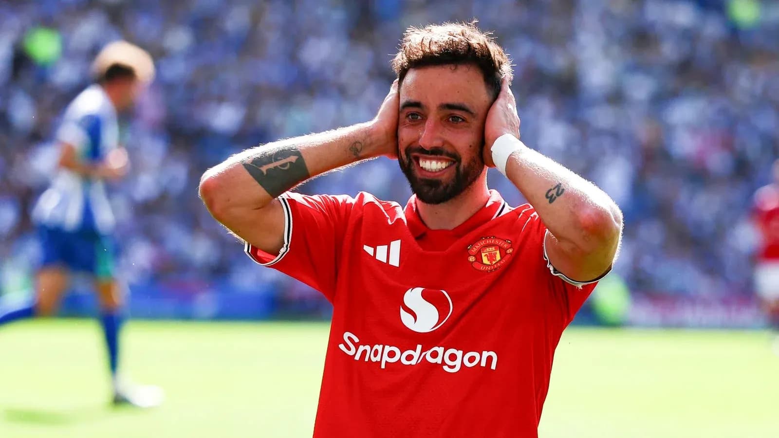 Bruno Fernandes celebrating after scoring a goal Bruno Fernandes celebrating after scoring a goal