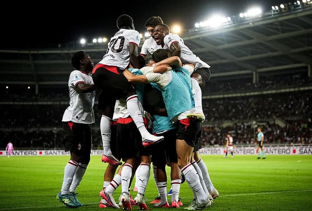 AC Milan players celebrating a goal during match AC Milan players celebrating a goal during match