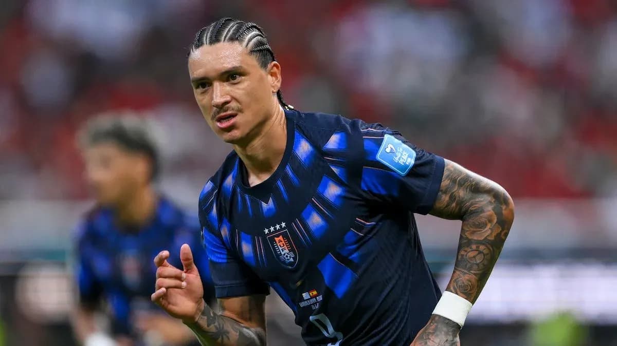 Player running during a football match in jersey Player running during a football match in jersey