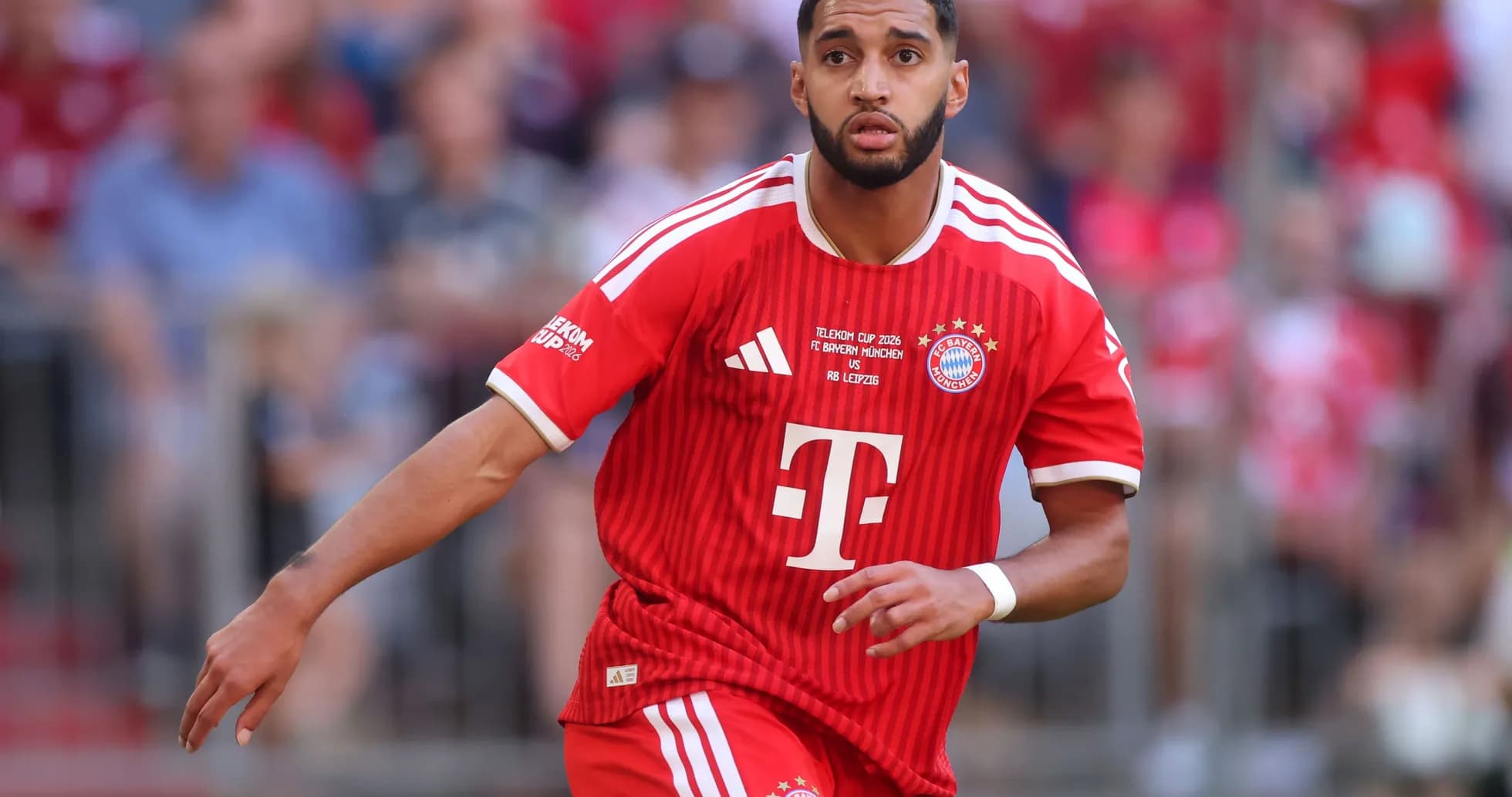 Player running in Bayern Munich red jersey during match Player running in Bayern Munich red jersey during match
