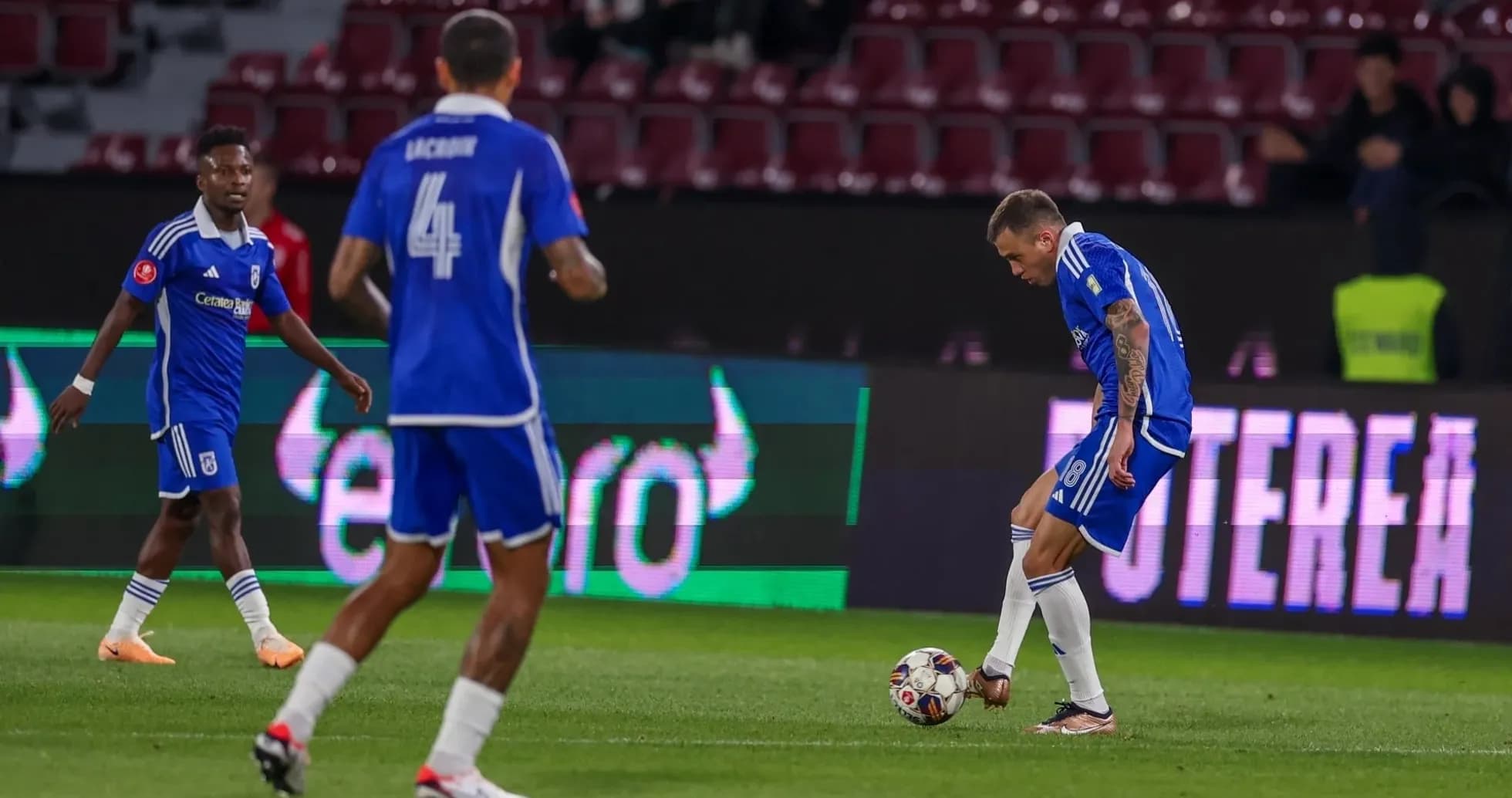 Universitatea Craiova players during match action Universitatea Craiova players during match action