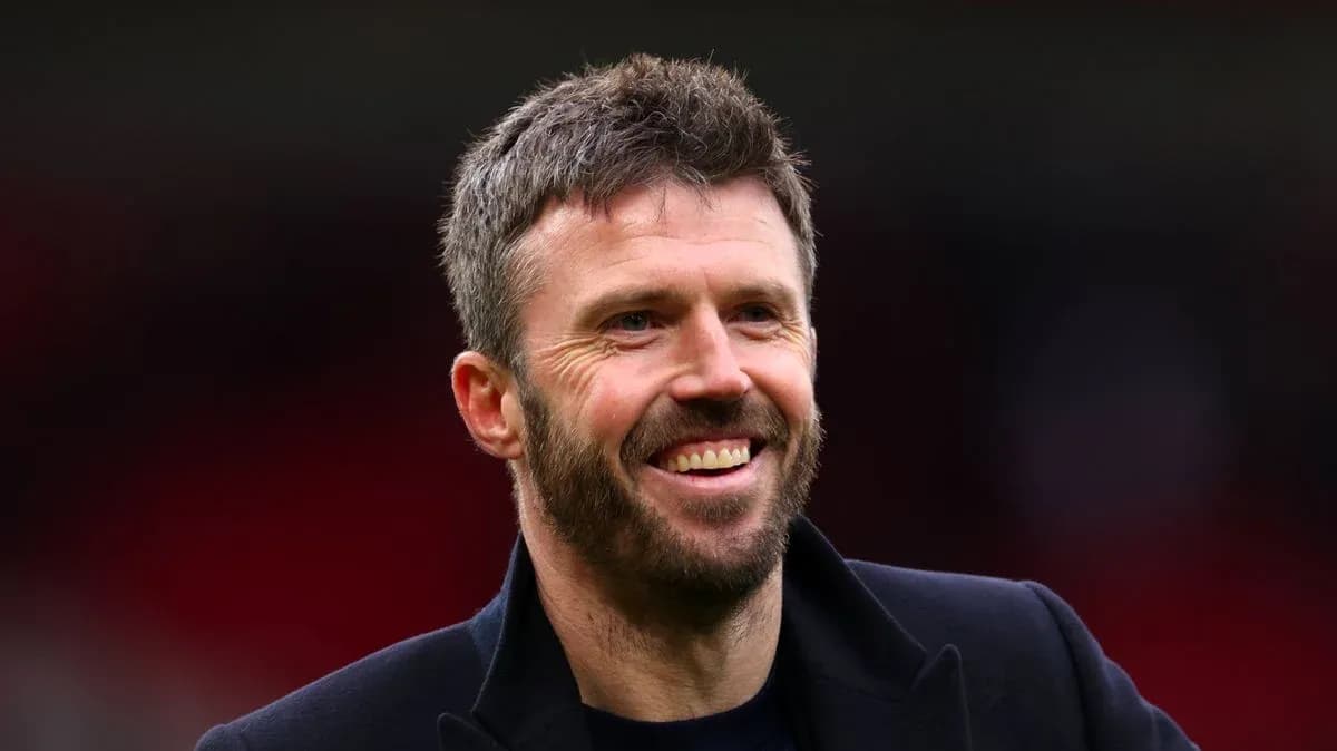 Man smiling in a sports setting Man smiling in a sports setting