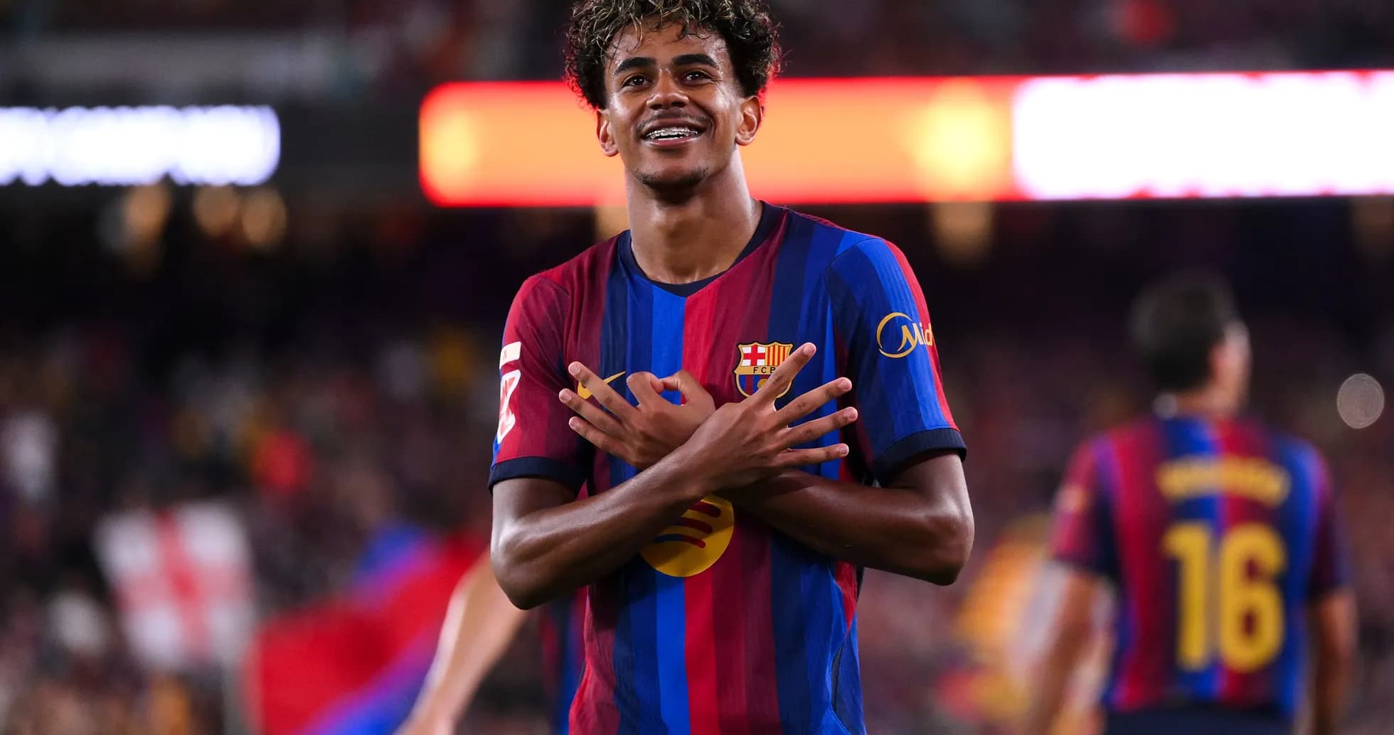Player celebrating a goal with crossed arms gesture Player celebrating a goal with crossed arms gesture