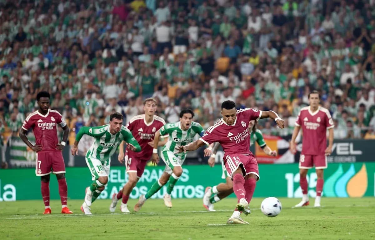 Player taking a penalty kick during match Player taking a penalty kick during match