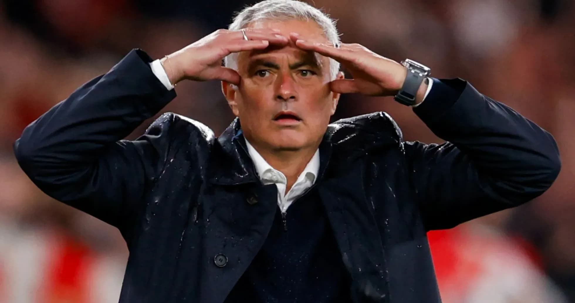 Manager signaling during a football match Manager signaling during a football match