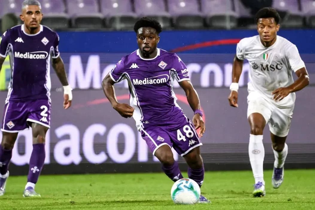 Fiorentina player dribbling the ball during match Fiorentina player dribbling the ball during match