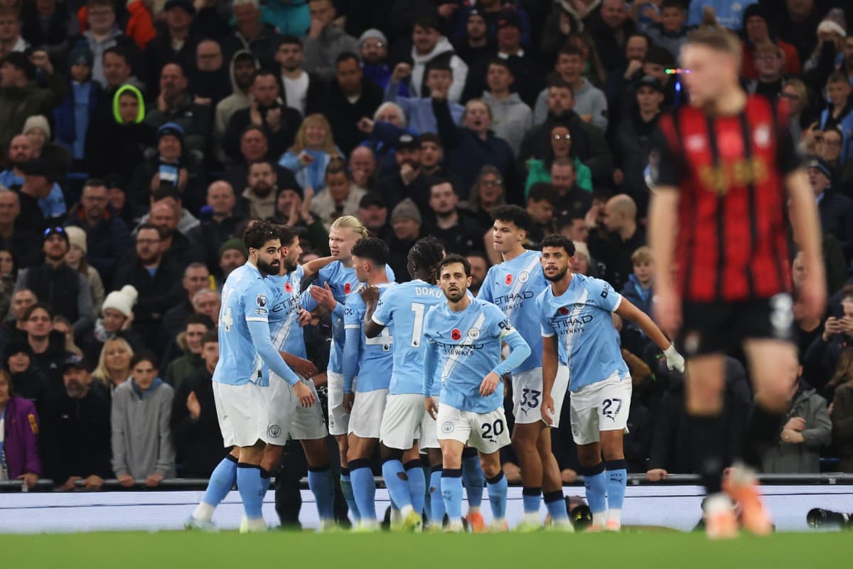 Manchester City players celebrating a goal Manchester City players celebrating a goal