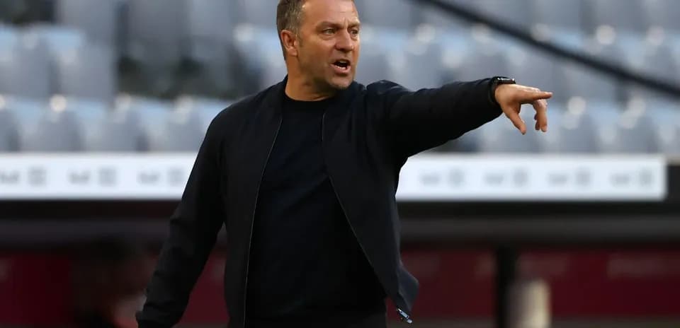 Coach giving instructions from the sideline Coach giving instructions from the sideline