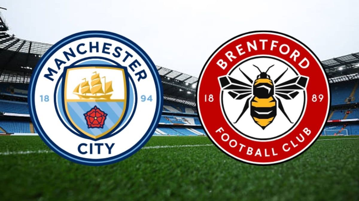 Logos of Manchester City and Brentford on pitch Logos of Manchester City and Brentford on pitch