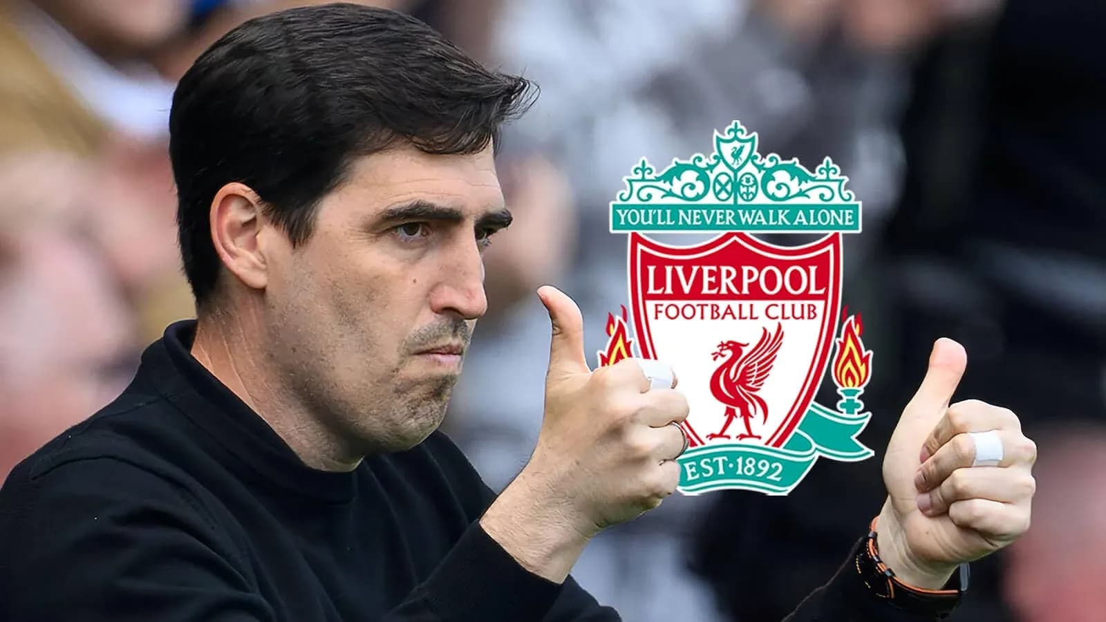 Coach giving thumbs up with Liverpool logo in background Coach giving thumbs up with Liverpool logo in background