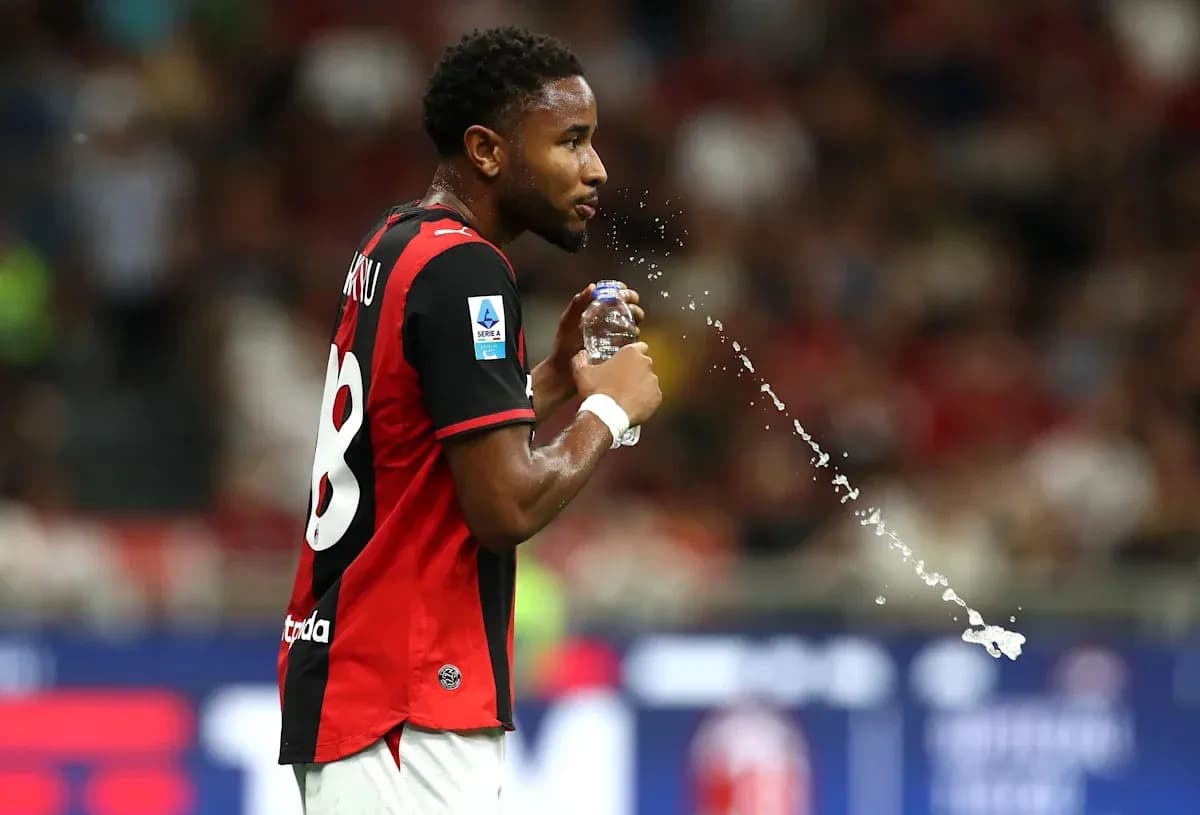 Player drinking water during a match Player drinking water during a match