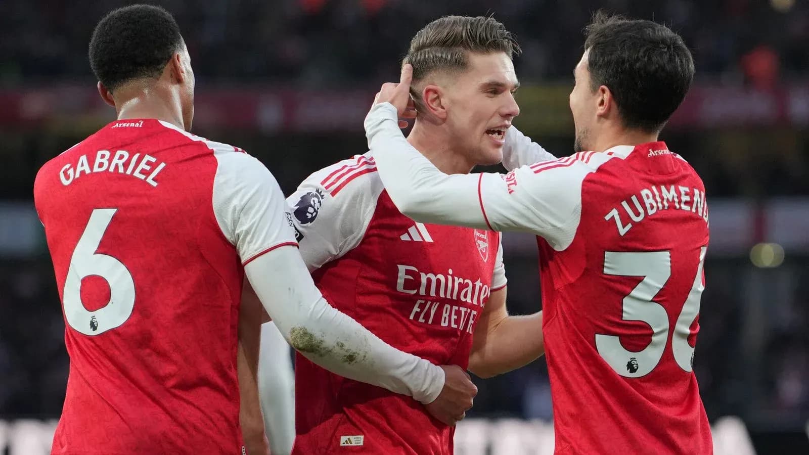 Arsenal players celebrating a goal during match Arsenal players celebrating a goal during match