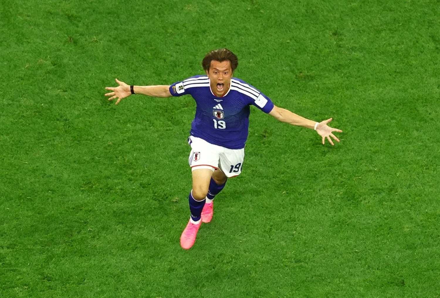 Japanese player celebrating a goal during match Japanese player celebrating a goal during match