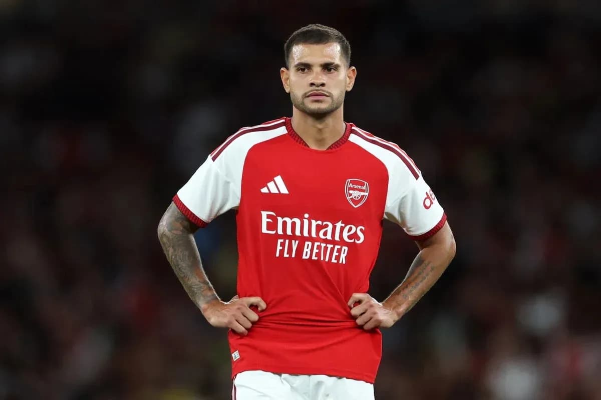 Player in Arsenal kit standing with hands on hips Player in Arsenal kit standing with hands on hips
