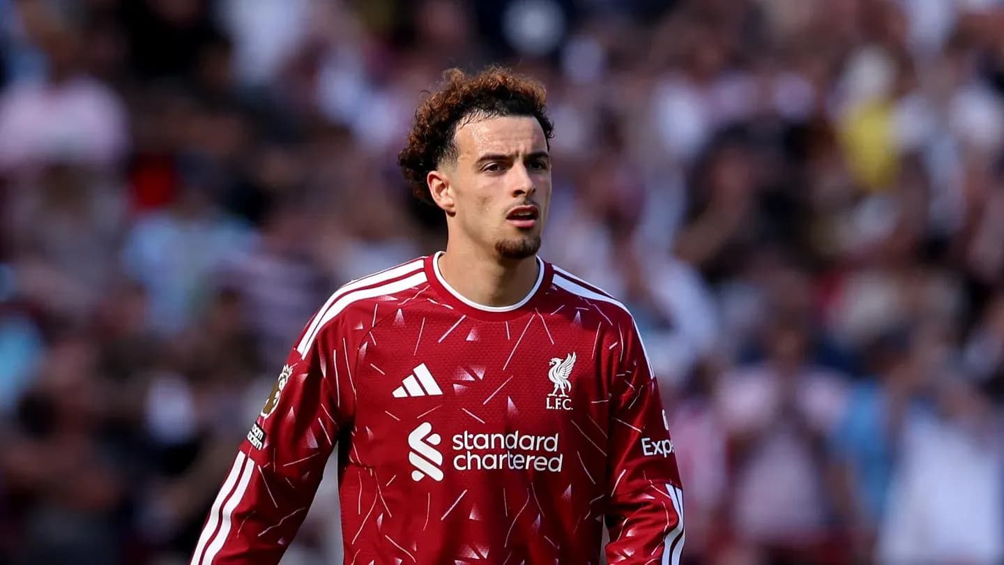 Player in Liverpool FC kit during match Player in Liverpool FC kit during match