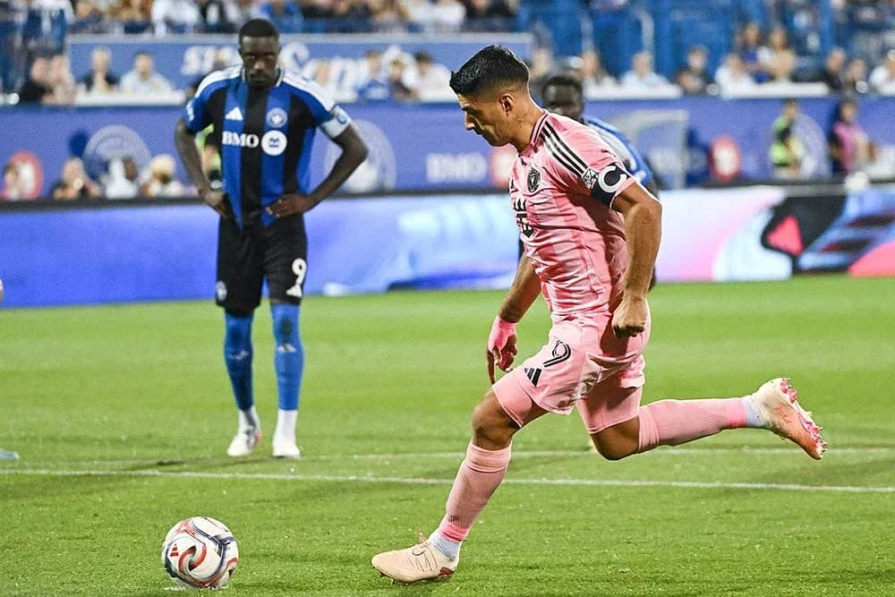 Player taking a penalty kick for Inter Miami Player taking a penalty kick for Inter Miami