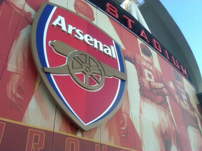 Arsenal logo displayed on stadium wall Arsenal logo displayed on stadium wall
