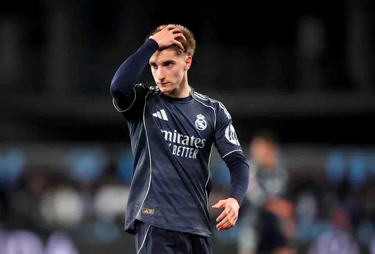 Player in Real Madrid kit walking with hand on head Player in Real Madrid kit walking with hand on head