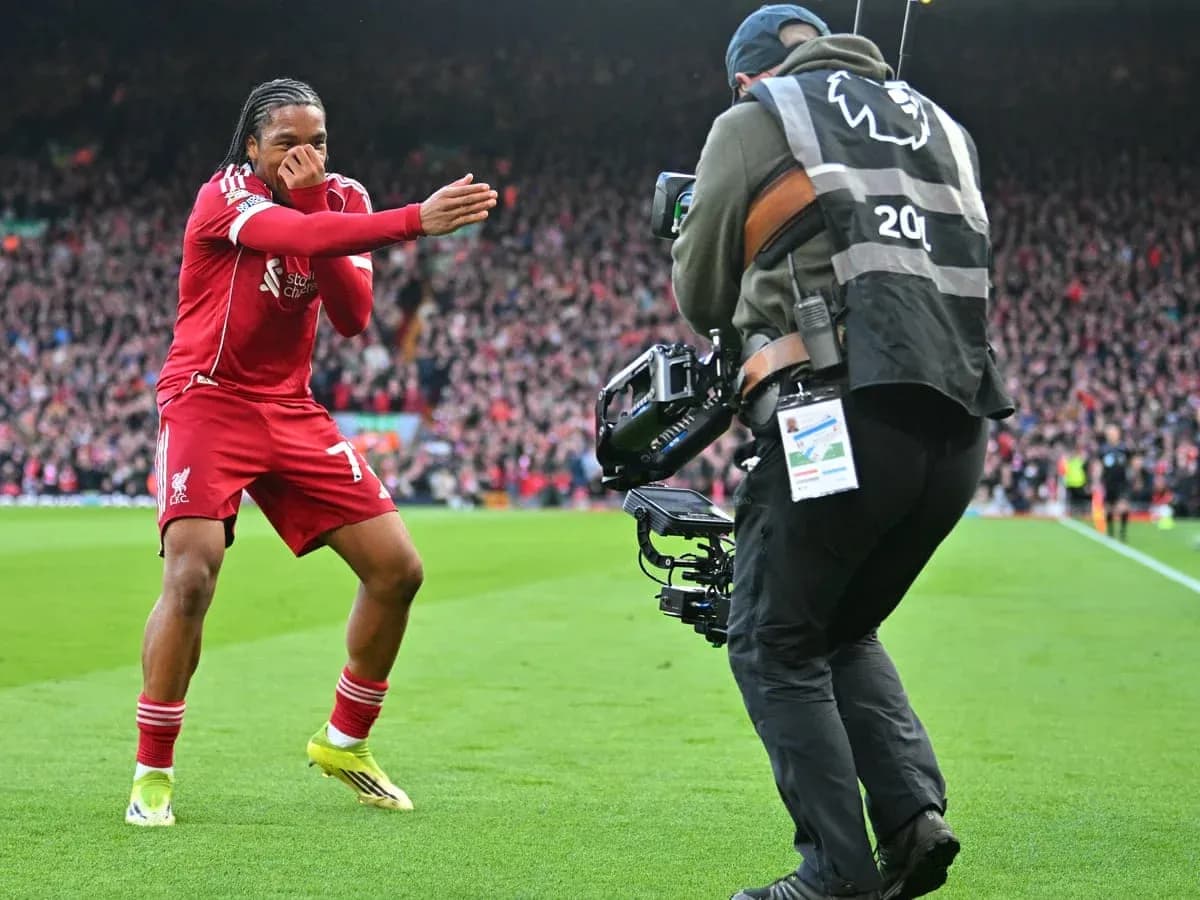 Player celebrating after scoring for Liverpool Player celebrating after scoring for Liverpool