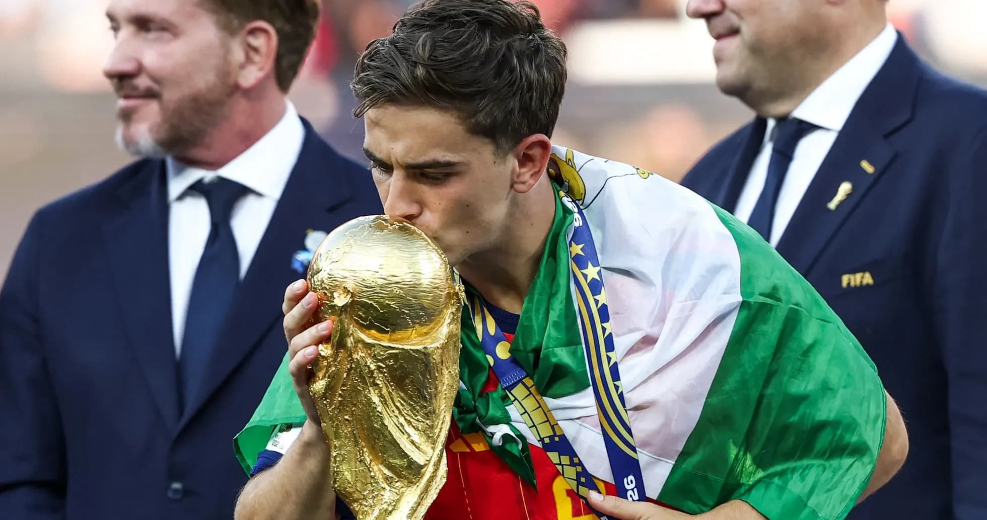 Player kissing World Cup trophy while celebrating Player kissing World Cup trophy while celebrating