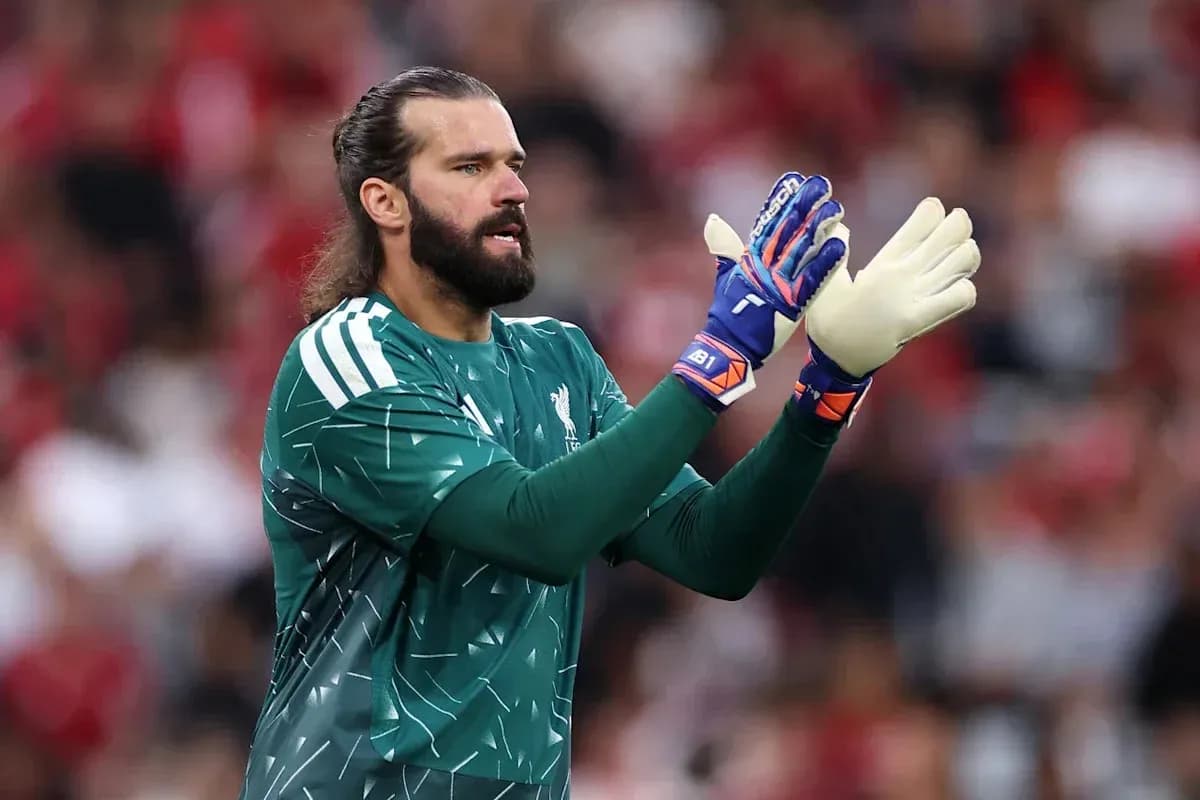 Goalkeeper in green kit signaling during match Goalkeeper in green kit signaling during match