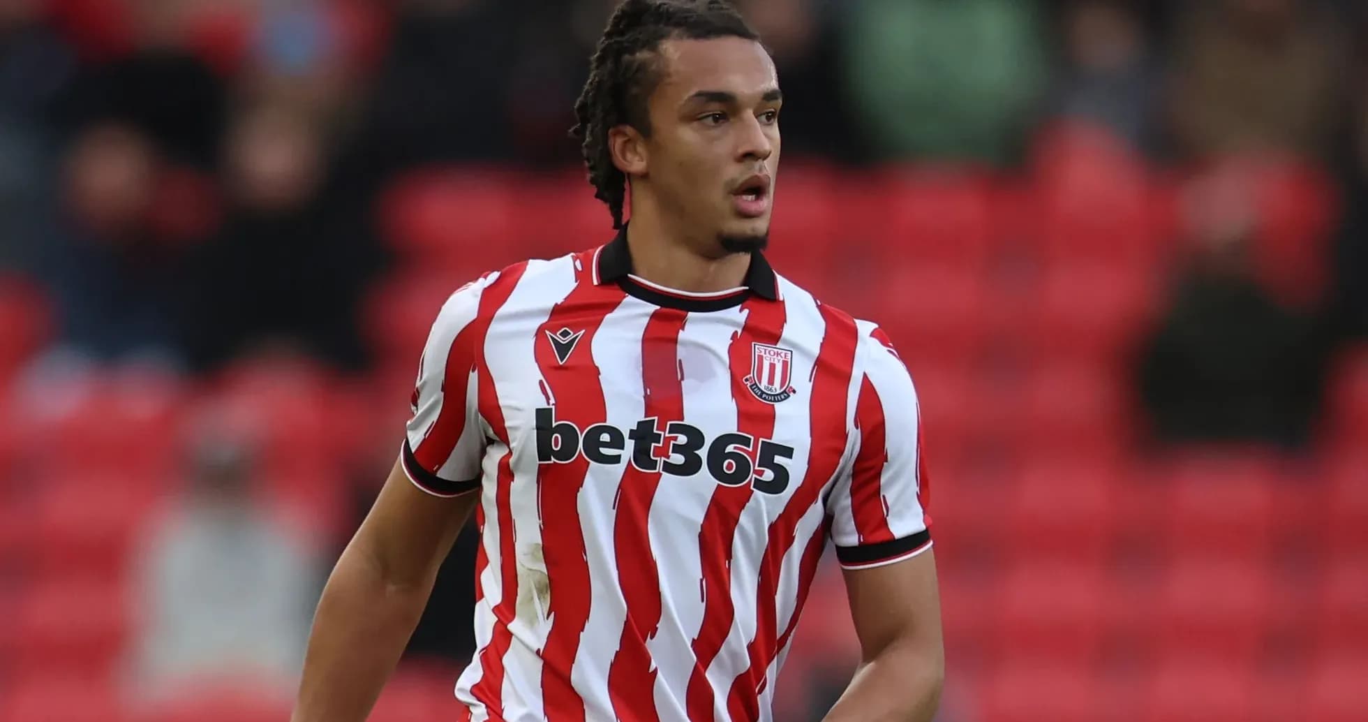Player in Stoke City jersey during match Player in Stoke City jersey during match