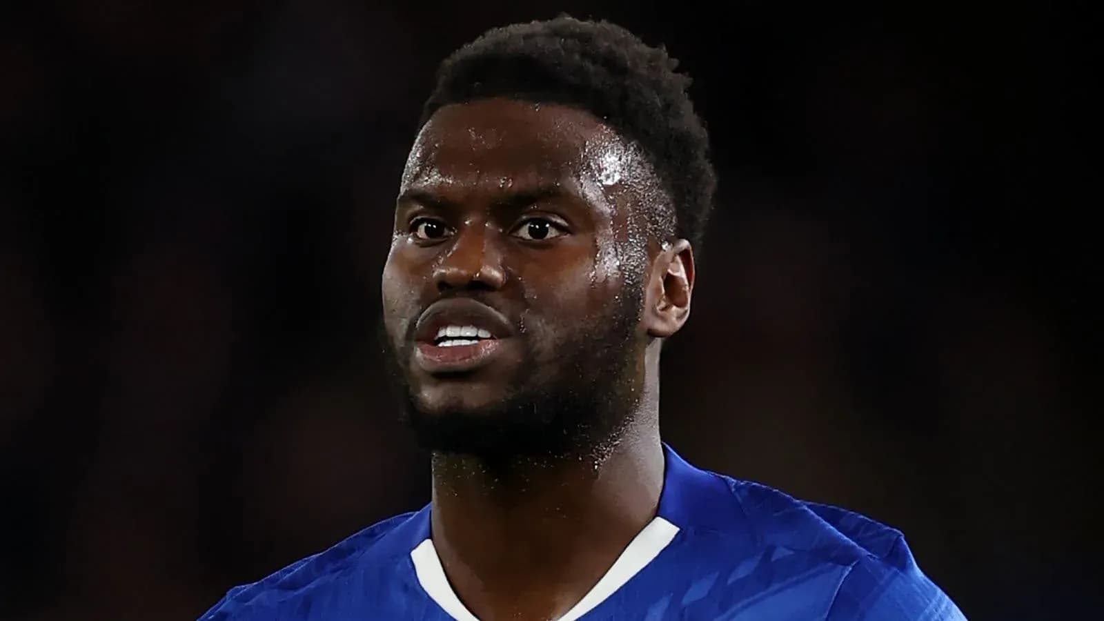 Player in blue kit during a match close-up Player in blue kit during a match close-up