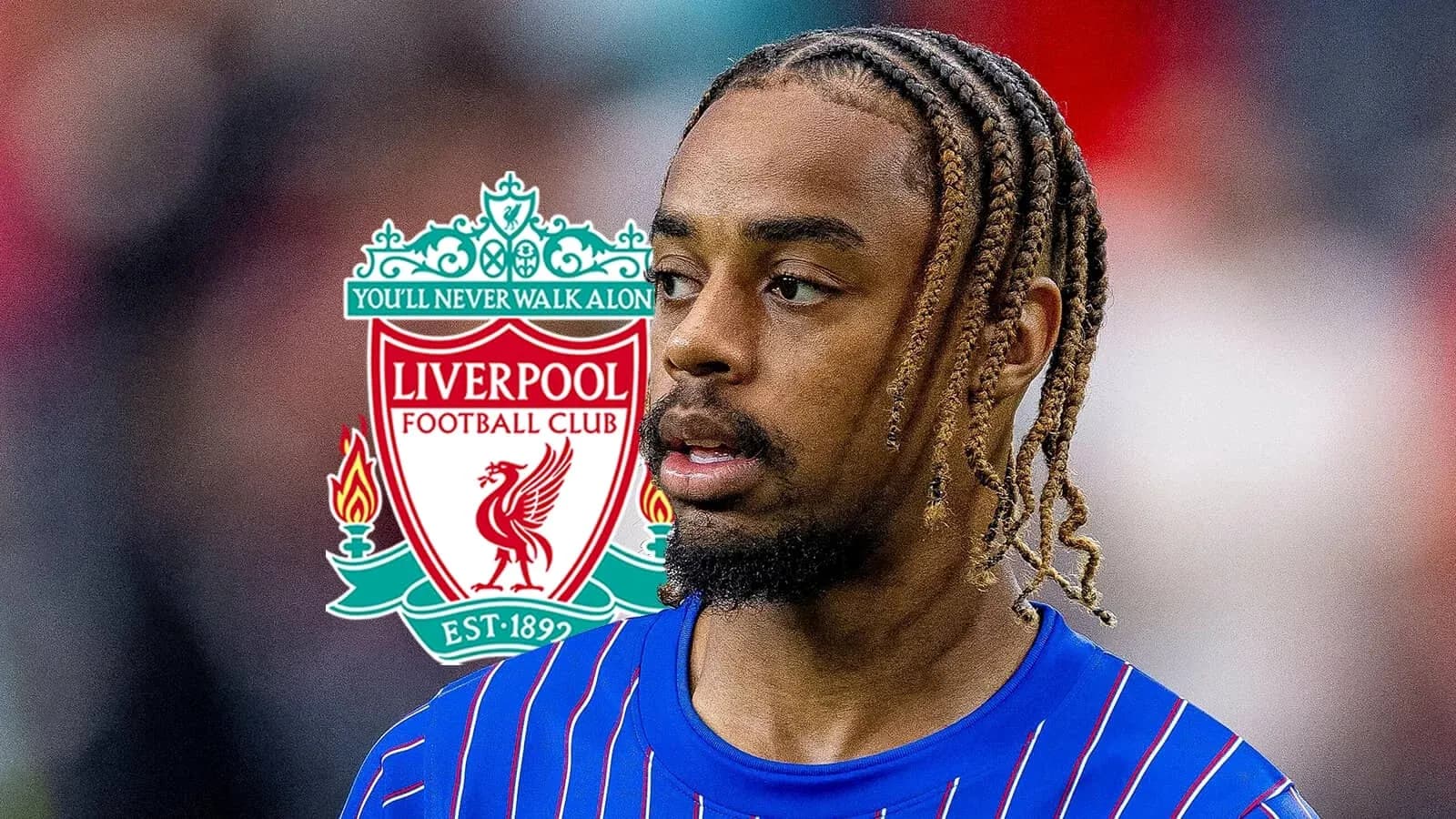 Player in blue kit with Liverpool logo background Player in blue kit with Liverpool logo background